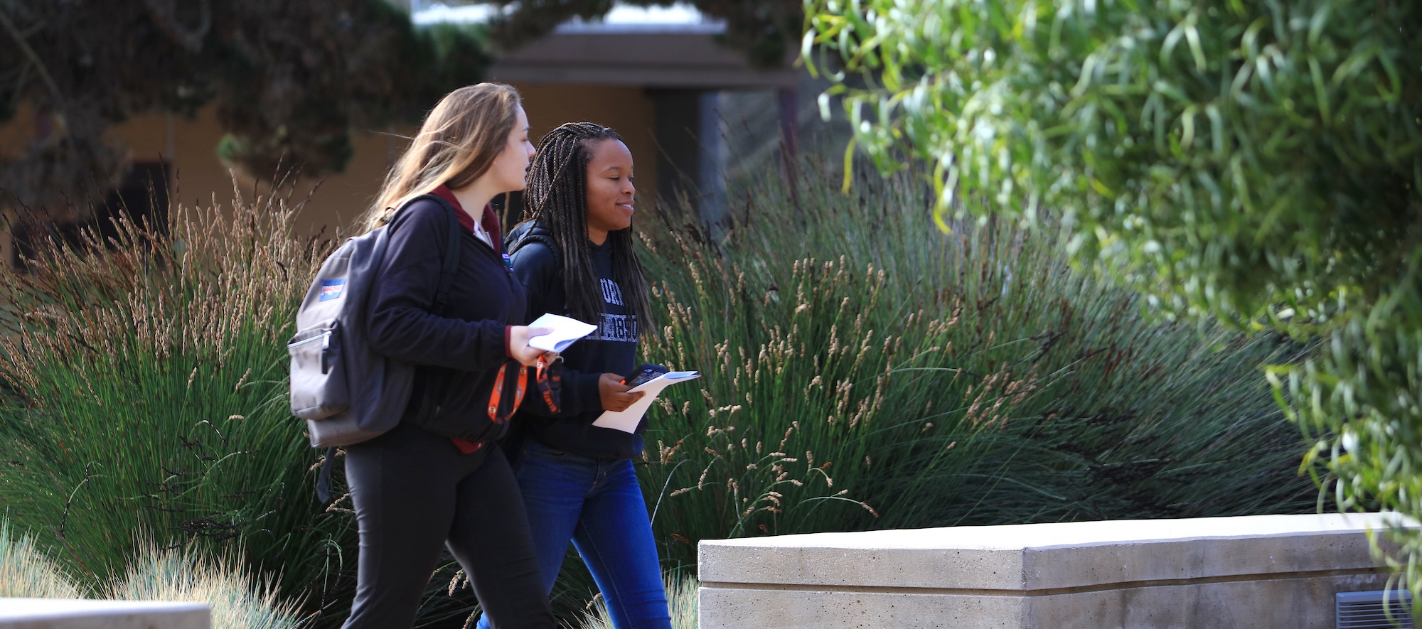 Students walking at the Marina Campus