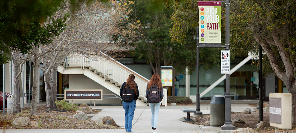 Students walking across campus