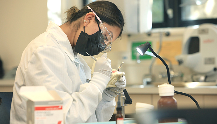 MPC Dental Assisting student practices skills during class