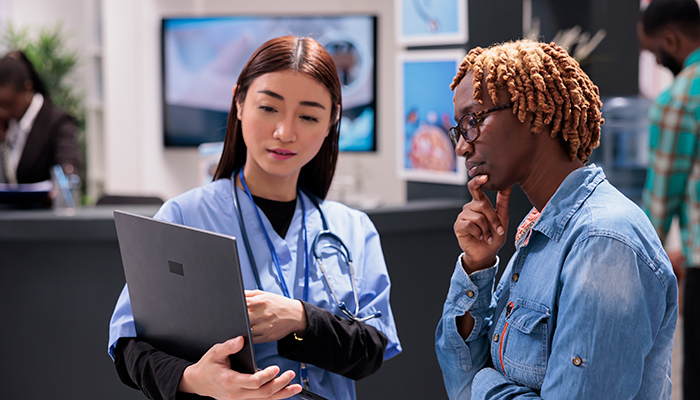 Community Health Worker explains test results to patient