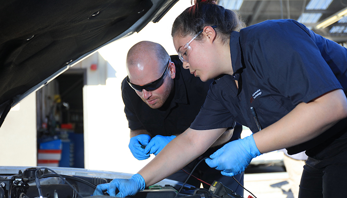 MPC students examine engine during automotive technology class