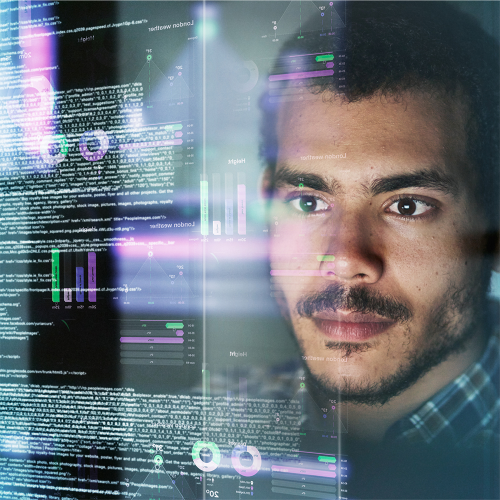 Student looking at code on a computer screen