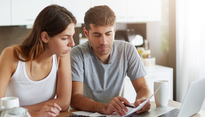 Couple reviewing their personal finances