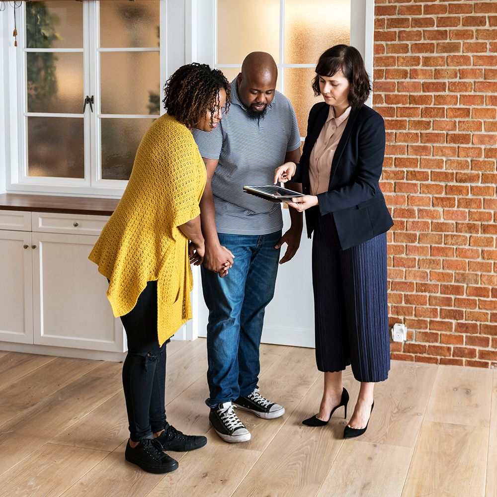 Real Estate agent helps new home owners find their dream home