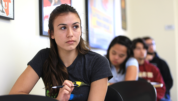 MPC Creative Writing student listens attentively in class