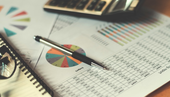 Paper with Data and Graphs with Pen and Calculator