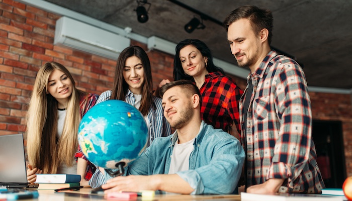 Group Huddling Around an Analyzing Globe