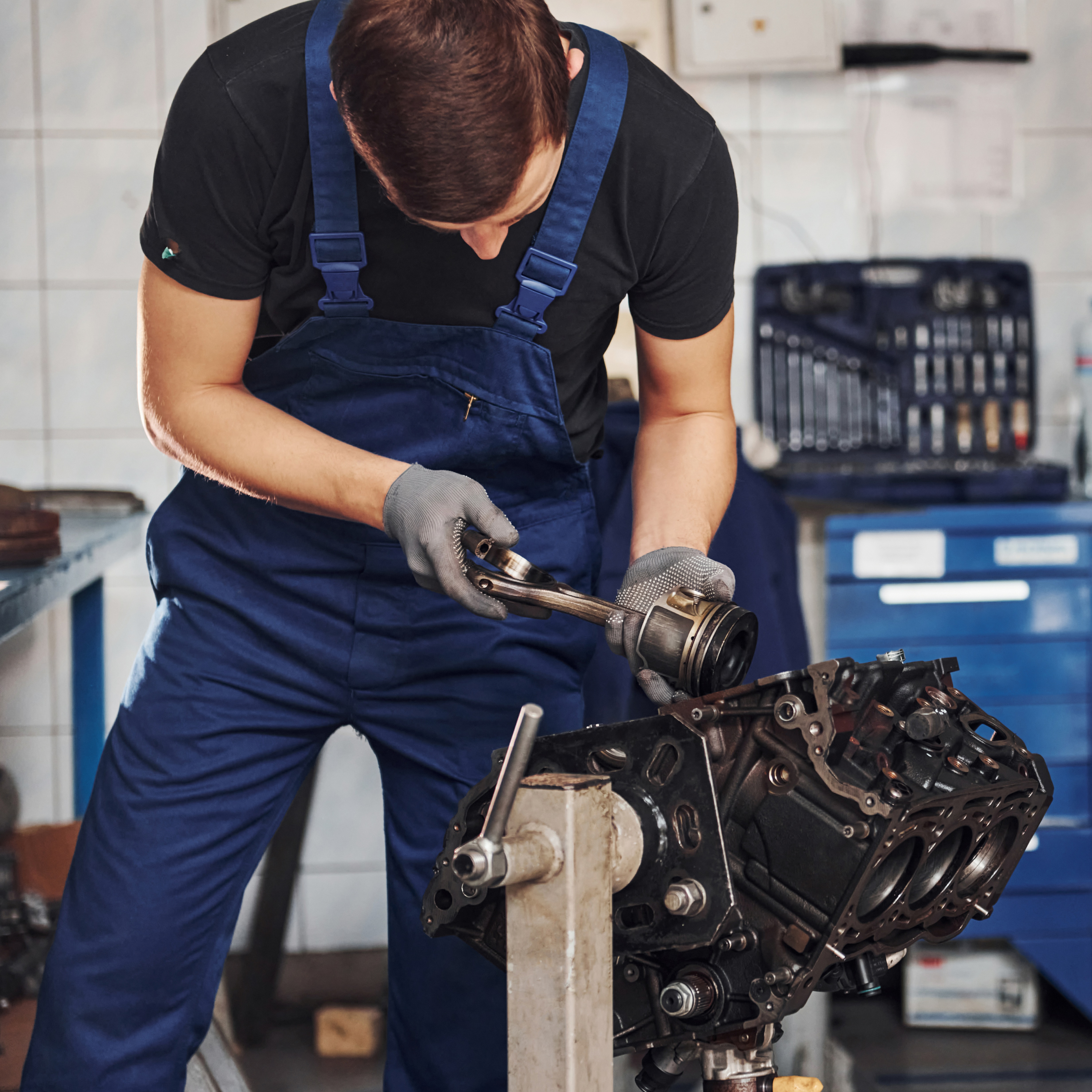 Mechanic Working on Car Engine