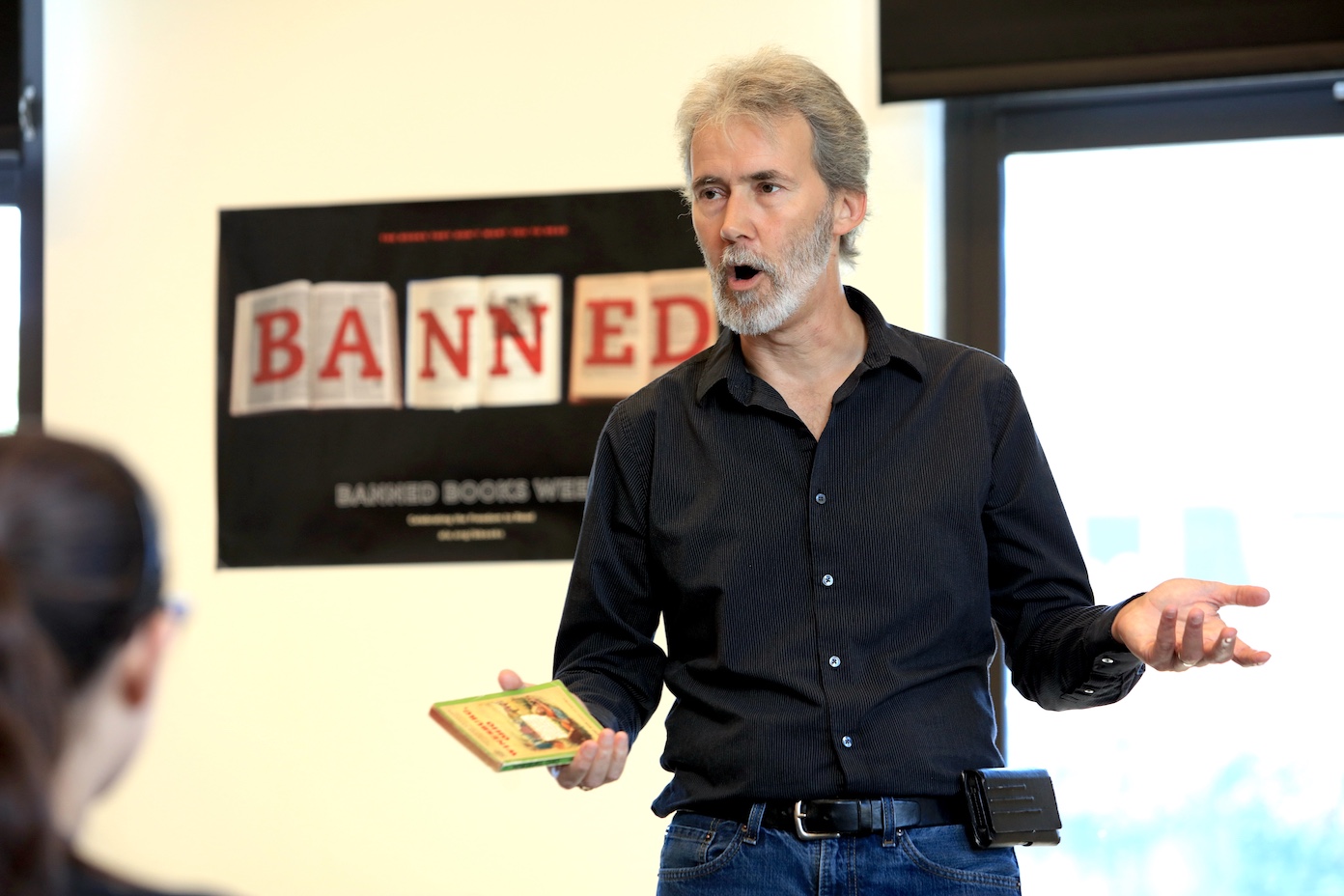 Professor Henry Marchand Speaking Out Loud to Audience During Banned Books Week Read-out