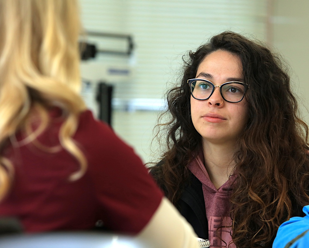 Student listening to counselor