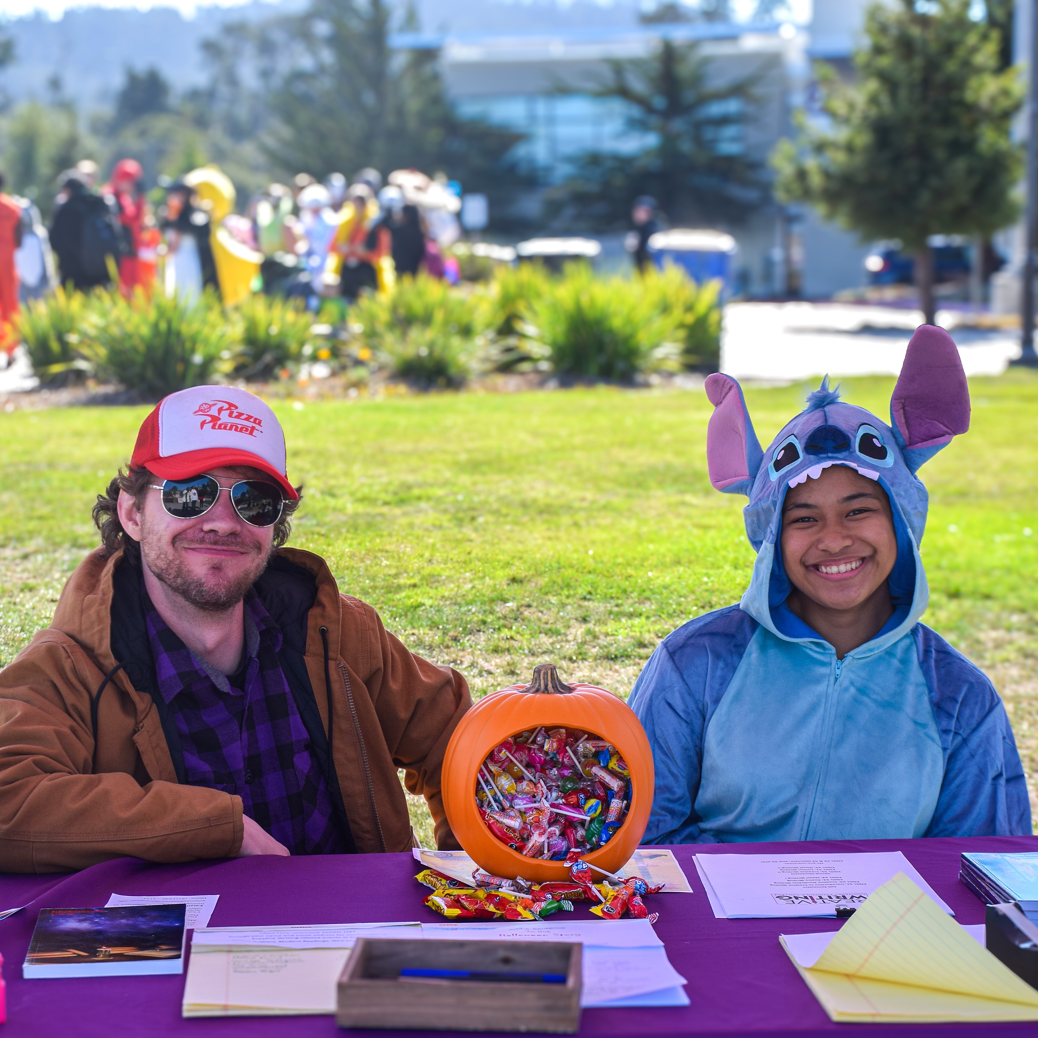 Students Dressed in Halloween Costumes Tabling at Harvest Festival Event