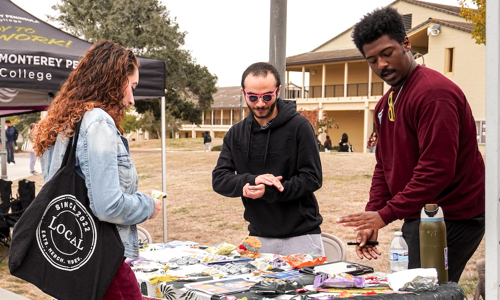 Student at Film Club Table During Lobo Day Event