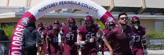 head coach Adrian Gallegos with mpc football team