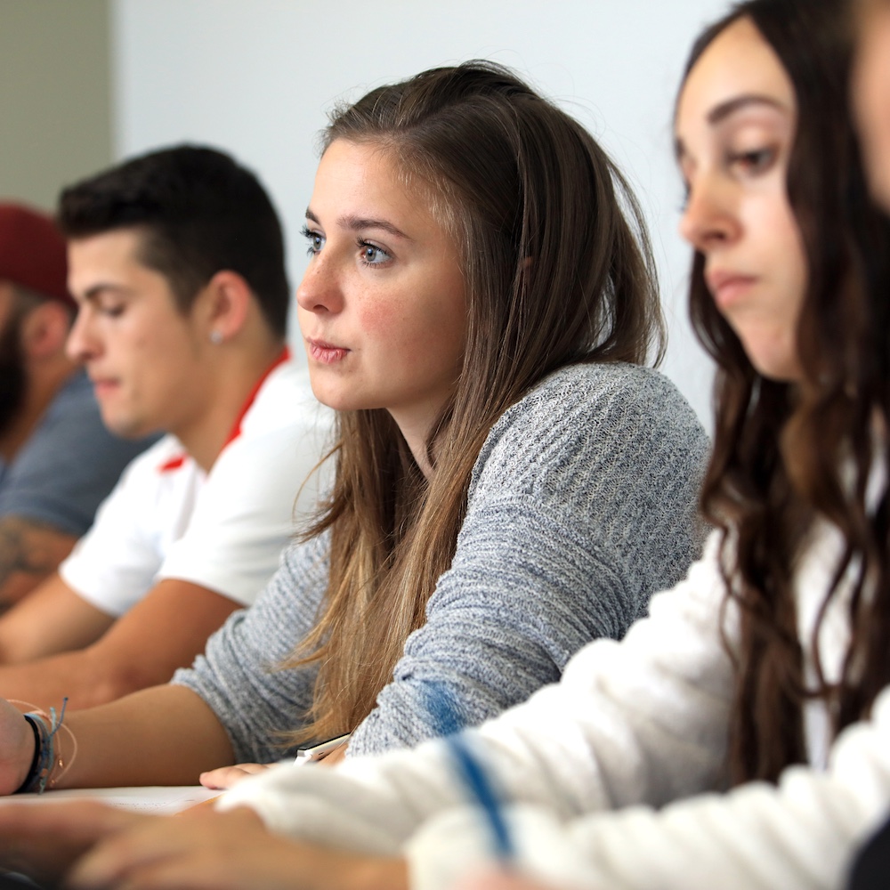 Students Taking Notes in Class