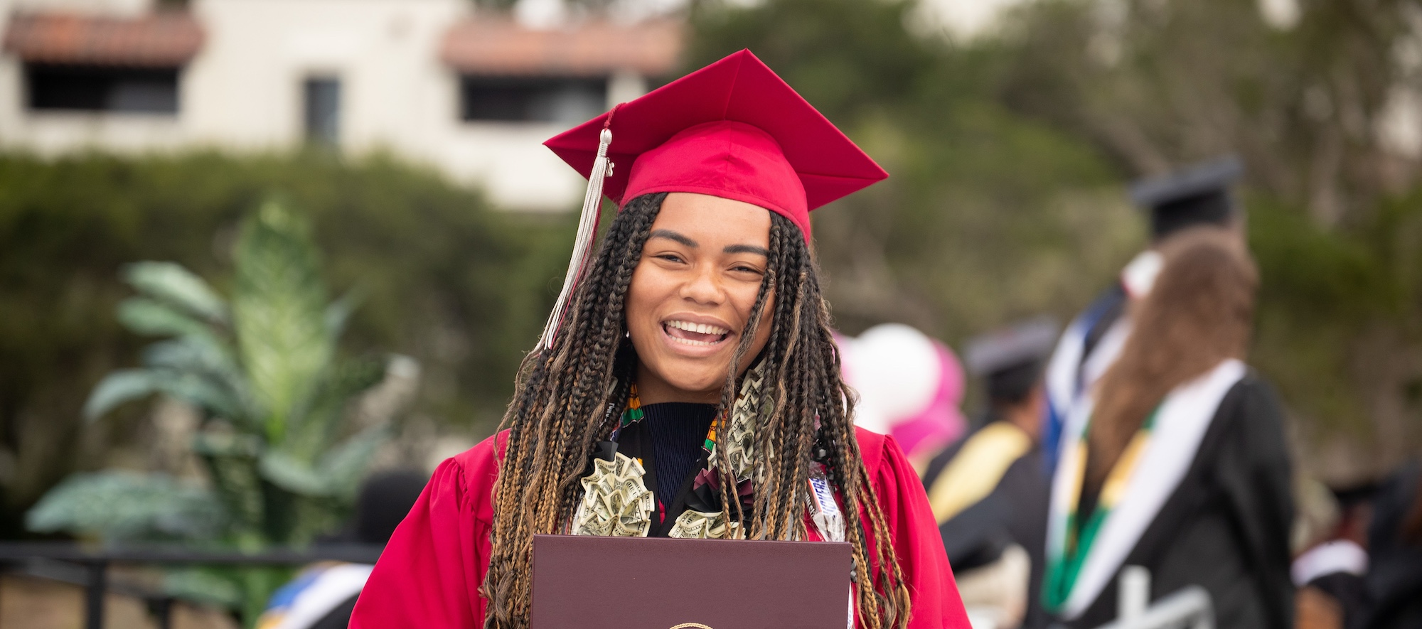 Umoja student graduating