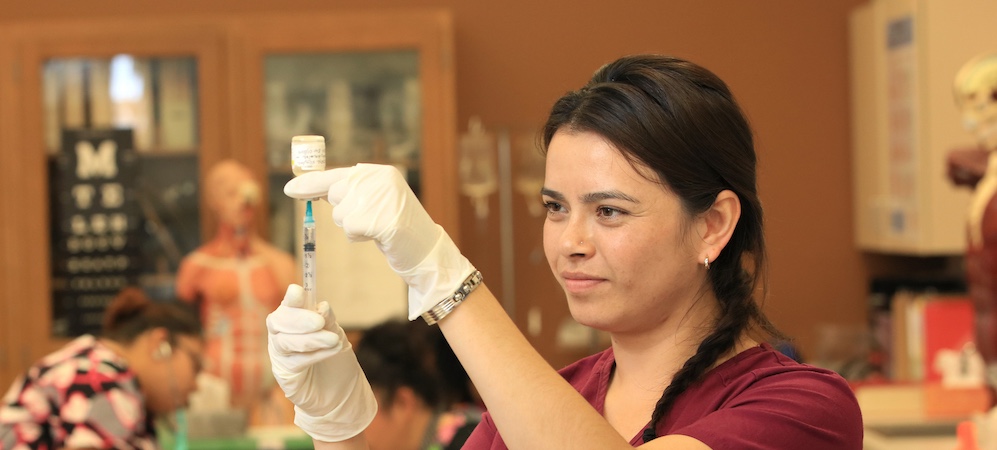 Nurse preparing to give shot